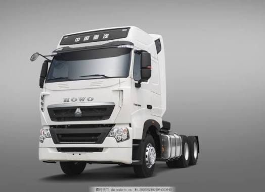 Used HOWO 6x4 tractor truck in good export condition, front view, powerful cabin for heavy haul logistics