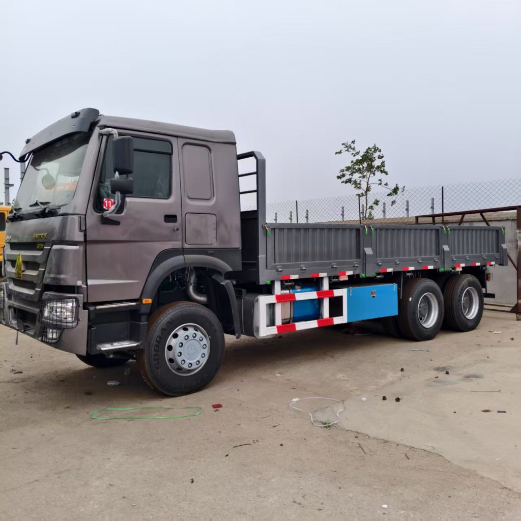 Used Chinese flatbed truck loading steel coil for Africa export