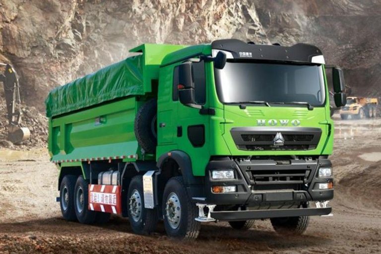 HOWO 371 6x4 dump truck for African mining operations, front angle on haul road