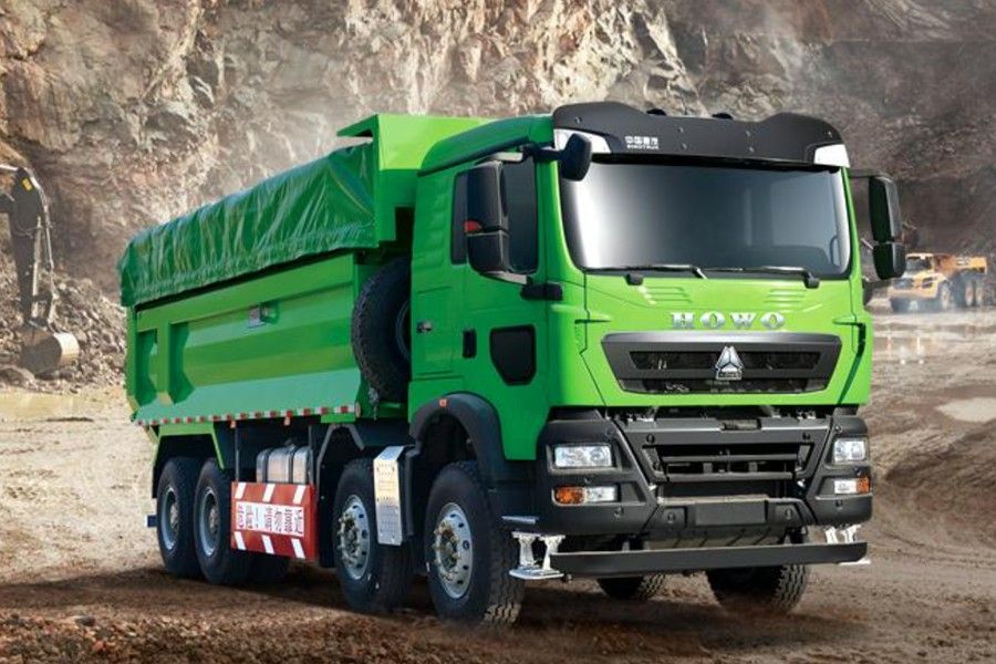 HOWO 371 6x4 dump truck for African mining operations, front angle on haul road